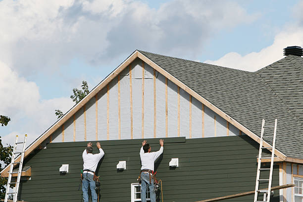 Professional Siding Replacement technician working in Raymond, OH